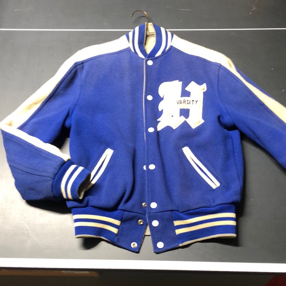 Reversible Varsity Jacket. Snaps. Front Slash Pockets. Gem
